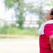 active woman in pain from herniated disc