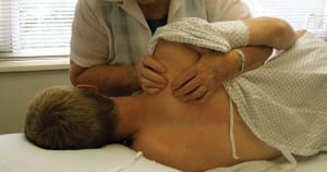 patient receiving PT treatment for myofascial pain