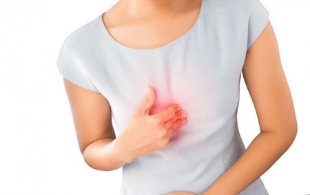 woman with heartburn