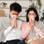 couple-home-sick-with-flu-cold-covid-symptoms